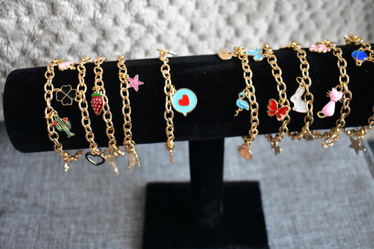 Gold tone Charmed Bracelets